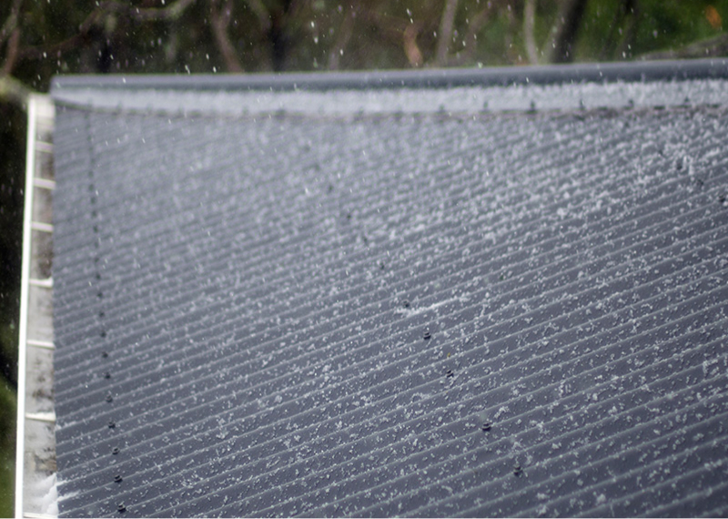 Say Goodbye to Hail Damage with Resi Metal Roofing